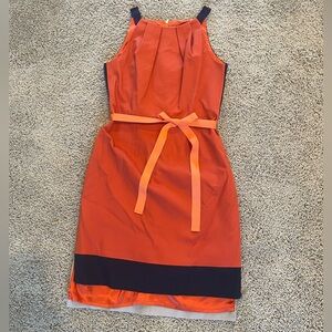 Women’s orange, navy, and white with bow tahari dress